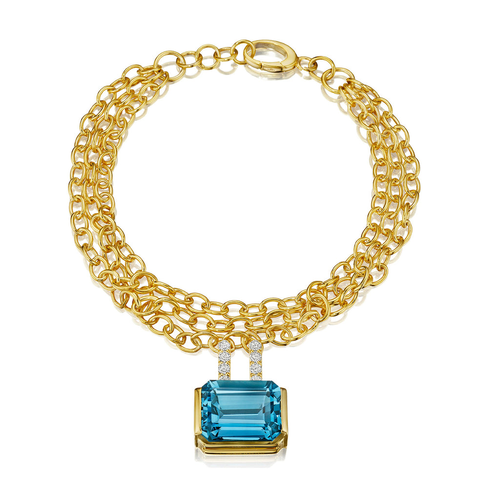 Yellow gold, blue topaz and brilliant diamonds bracelet